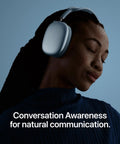 Person wearing AirPods Max 2 Wireless Over Ear Headphones With Active Noise Cancellation Adaptive Audio Personalized Spatial Audio