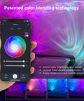 LED Aurora Projector With Northern Lights Vibe WiFi App Control in use, displaying vibrant colors in a bedroom setting.