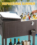 80 Quart Rolling Ice Chest Portable Bar Cooler With Catch Basin, Bottom Storage Tray And Bottle Opener For Patio, Beach, BBQ And Party Gatherings In Durable Rattan Finish by a pool