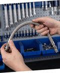 Badass Half Inch Stainless Steel Braided Air Hose High Pressure Heat Resistant Jumper For Industrial Air Compressor Pump Discharge Vibration Absorbing Heavy Duty Pro Grade Quality Keeps Moving Smooth Easy Install Shop Ready Top Tier, held by hands