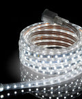 Coiled Lit 100 Foot LED Rope Light Kit With 27000 Lumens, 6000K Pure White, Dimmable, showing flexible strip and connector plug
