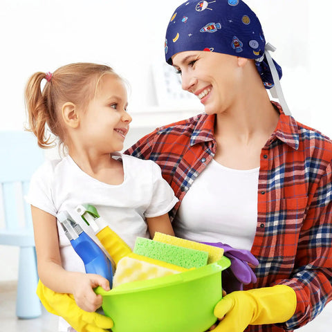 Person wearing blue cap from 8 Pack Women's Scrub Caps With Buttons In Eight Different Patterns Adjustable Bouffant Surgical Hat With Ponytail Holder