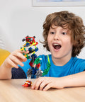 Adventure Wheels Building Set For Creative STEM Play, 480 Classic Pieces To Build Cars, Trucks, And More, Kid Approved, Mega Fun Build Kit For Ages 7 And Up, Amazon Exclusive; child holding model