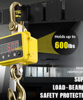 Digital weight scale hanging on E-track, indicates holding capability up to 600 lbs. Demonstrates load-bearing reinforcement.