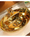 Countertop Bathroom Sinks Ceramic Wash Basin Golden Sink Bathroom Countertop Sinks Hotel Ceramic Art Basin Vessel Sink close-up view.