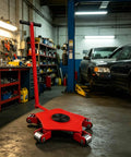 Tough As Nails 360 Swivel Skate Dolly Engineered For Dual Surface Glides in a garage, featuring sturdy design and 360-degree wheel mobility.