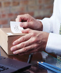 Heavy Duty Shipping Labels With Sleek Peel Off Backing Drop Right On Parcels For Instant Prep Works Dead Simple With Labelwriter Printers Using Direct Thermal Tech To Dodge Ink Bills Captures Six Line Addresses On Popular 2 5 16 By 4 Inch Rolls Holding, applied to a cardboard box.