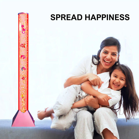 Bubble Floor Lamp With 7 Color Changing LED Mood Lights For Sensory Rooms Dope Ocean Vibe Water Tube Night Light 90cm Tall Golden Rose Base Cozy Gift For Kids Teens And Adults next to smiling woman and child.