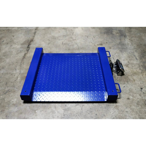 Badass Industrial Drum Scale Featuring Smooth Rolling Ramps Hella Rugged Platform Weighs Two Thousand Five Hundred Pounds on concrete floor.