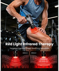 Man using T2 Ultra Percussion Massage Gun With Heated Infrared Red LED Therapy For Deep Tissue Muscle Recovery on leg in gym.
