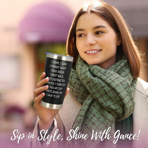 Funny 50th Birthday Tumbler 20 Oz Stainless Steel Insulated Cup For Men And Women Rocking The Big Fifty in hand during outdoor setting.
