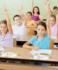 Students in classroom using Clear Self Adhesive Desk Name Tag Pockets 40 Pack 14.5 By 4.3 Inch Thick Reusable Plastic Nameplate Sleeves