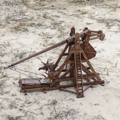 Mini Counterweight Trebuchet Model Kit for Adults, 3D Wooden Puzzle Siege Engine, DIY STEM Project, Tabletop Toy, Alder Veneer Plywood Build, Ages 14 Plus, Totally Fun Historical Replica on sandy ground