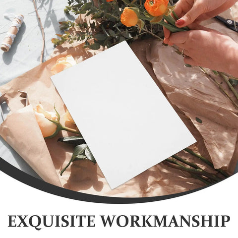 Boss Grade Flower Wrapping Paper Kit 200 Pieces 21x14 CM White Paper For Florists shown with flowers on a table
