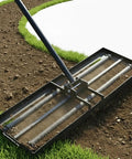 Heavy Duty Lawn Leveling Rake With Four Spiked Wheels And Smooth Roller leveling grass and soil on a golf course