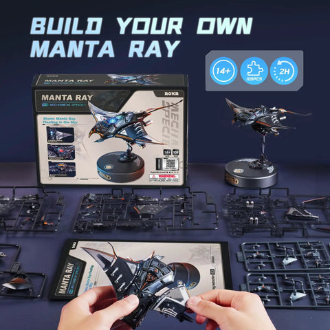 Hands assembling Manta Ray 3D Metal Model Puzzle for Adults and Teens, with packaging and unassembled pieces shown