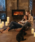 Couple relaxing with Flickering Flameless Candles With 3D Moving Flame 1000 Plus Hours Battery Operated Pillar Candles With Timer