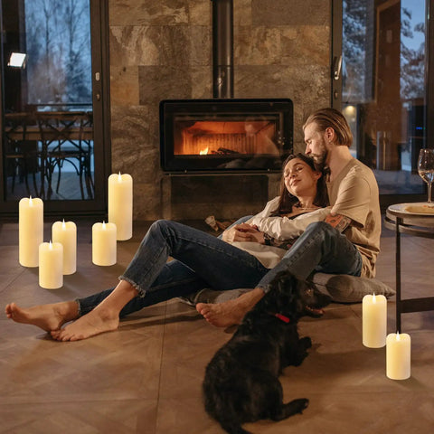 Couple relaxing with Flickering Flameless Candles With 3D Moving Flame 1000 Plus Hours Battery Operated Pillar Candles With Timer