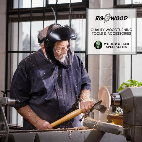 Man wearing a face shield using woodturning tools with RG Wood logo and "Quality Woodturning Tools & Accessories" text in background.