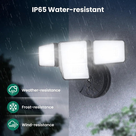 70W 7000LM LED Flood Light With 4 Adjustable Heads Switch Controlled Outdoor Security Lighting in rain demonstrating IP65 waterproof feature