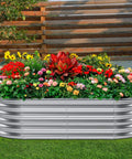 Heavy Duty Galvanized Raised Garden Bed Kit For Veggies, Oval 4 By 2 By 1.5 Feet Outdoor Planter Box with colorful flowers