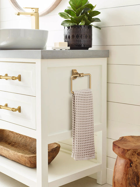 Side view of a bathroom vanity with Davenport Champagne Bronze Cabinet Pull Six and a Half Inch Overall Length Five and One Sixteenth Inch Center to Center Transitional Style Drawer Handle for Cabinets Drawers Furniture One Pack visible on drawer front.