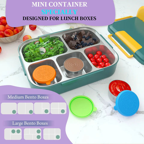 Lunch box with Leakproof 1.6 Ounce Stainless Steel Salad Dressing Containers With Lids On The Go inside, surrounded by fresh ingredients.