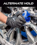 Person using Ergonomic Wheel And Rim Cleaning Brush With Ultra Soft Bristles For Tires And Rims Rubber Lined Sides For A Firm Grip 10.3 Inch Length Gray Auto Detailing Tool on car wheel.