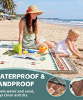 2 In 1 Extra Large Boho Beach Blanket Towel Giant Woven Outdoor Picnic Mat For Camping And Travel on beach with family