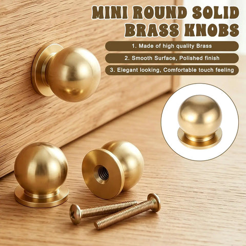 Real Deal Quality Top Shelf Solid Brass Mini Knobs One Half Inch Gold Drawer Pulls Four Pack With Screws on wood.