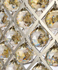 Close-up view of Madison Collection Ten Light Pendant with royal cut clear crystal spheres on polished nickel frame.