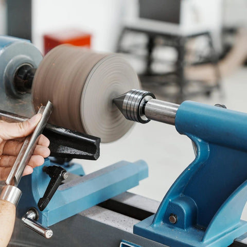 Heavy Duty MT2 Live Tailstock Center For Wood Lathe With 60 Degree Ball Bearing Tip Bad Boy Woodworking Accessory in use on a lathe.