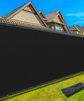 Chain Link Fence Privacy Screen 6 By 50 Feet, 90 Percent Privacy Outdoor Fence Cover With Brass Grommets installed in backyard