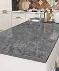 Dark grey marble Peel And Stick Countertop Cover on kitchen island, self-adhesive waterproof vinyl laminate, 15.8x394 inches.