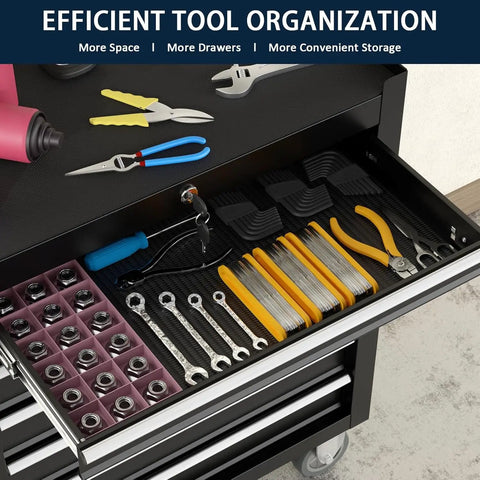 Open drawer of 7-Drawer Rolling Tool Chest With Locking System showing organized wrenches and pliers, black alloy steel cabinet