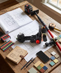 Pro Grade Fine Tuning Bracket Level Adapter with L Shape Magnetic Pivoting Base on table with tools and blueprints.