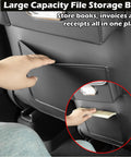 Custom Fit Seat Back Kick Protector And Rear Organizer For Tesla Model Y Model 3 Model S And X showing file storage bag and hand inserting documents.