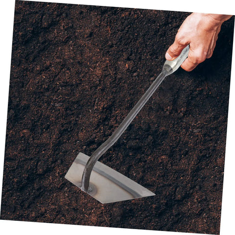 Hand holding 4-Piece Garden Hoe Set For Weeding And Soil Loosening, Durable Hand Tools For Digging, Wear-Resistant Blade in soil
