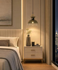 Tribesigns 11" Modern Pendant Lighting with Gradient Green Glass Shade above a bedside table in a stylish bedroom.