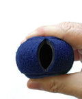 Hand holding Blue 2.36 Inch Heavy Duty Precut Tennis Ball Floor Protector showing interior opening for furniture leg