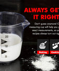 Clear Plastic Measuring Cup With Easy Read US And Metric Markings, 1 Cup Size, Durable Dishwasher Safe, on black surface with powder
