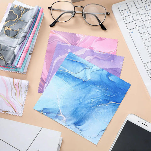 20 Pack Microfiber Cleaning Cloths Set For Eyeglasses, Camera Lenses, And Phone Screens, Marble Design Soft Wipes on desk