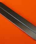 2 Pack Nickel-Coated Bar Magnets, 3 By One Eighth By Five Sixteenth Inch Rectangular Neodymium Mounting Magnets on orange surface