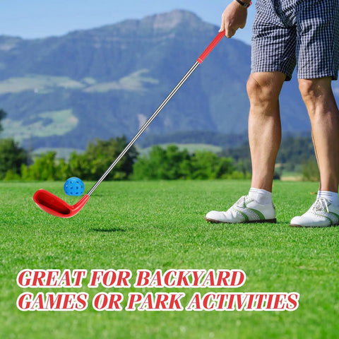 Person using Left Hand 36 Inch Plastic Golf Chipping Club Set With Oversized Head For Home Backyard Bucket Game, grass background