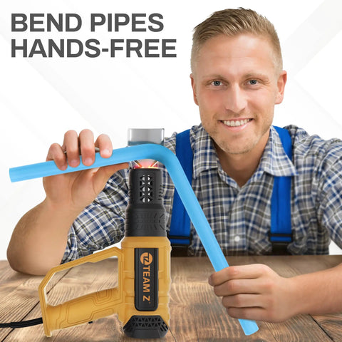 Man using Pro Grade Heavy Duty Heat Gun Kit With Case Upgrade LCD Display for bending pipe hands-free on table.