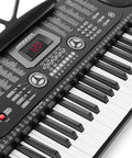 61 Key Digital Keyboard Piano Kit With Stand and Bench for Beginners, Electric Keyboard control panel and keys close-up