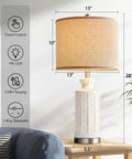 White Ceramic Table Lamps Set Of 2 With USB Charging Ports For A Cozy Modern Nightstand Vibe 28 Inch Tall Linen Drum Shade 3 Way Dimmable Touch Includes 2 LED Bulbs For Living Room And Bedroom, one lamp on nightstand with features icon.