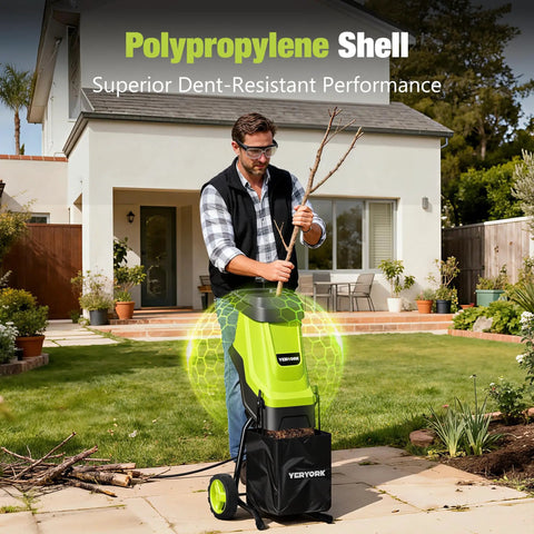 Man using Electric Wood Chipper And Shredder With 15 Amp Motor, 1.8 Inch Cutting Capacity, 45 Liter Collection Bag, in yard