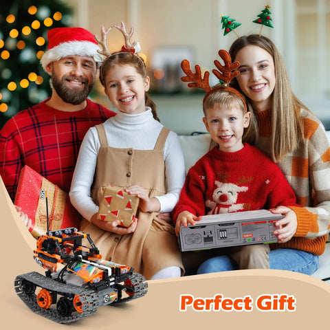 Family with Christmas decorations, holding gifts, including Three In One STEM Robot Kit For Kids Aged 8 To 12 With Remote Control.