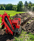 Dependable Rubber Track Trencher Built For Rapid Orchard Drainage And Zero Stress Soil Prep Featuring Adaptive Custom Models Made For Tenacious Pros And Yard Warriors cutting a trench in a grassy field.